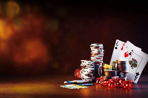 A woman in a luxurious green gown next to an ornate roulette wheel, capturing the upscale casino mood of CROWNBD.